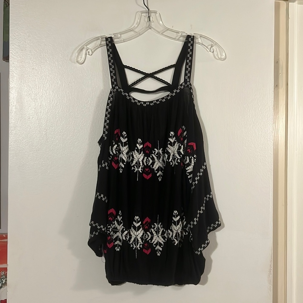 Free People black/embroidery peep shoulder top. straps w/crisscross back detail